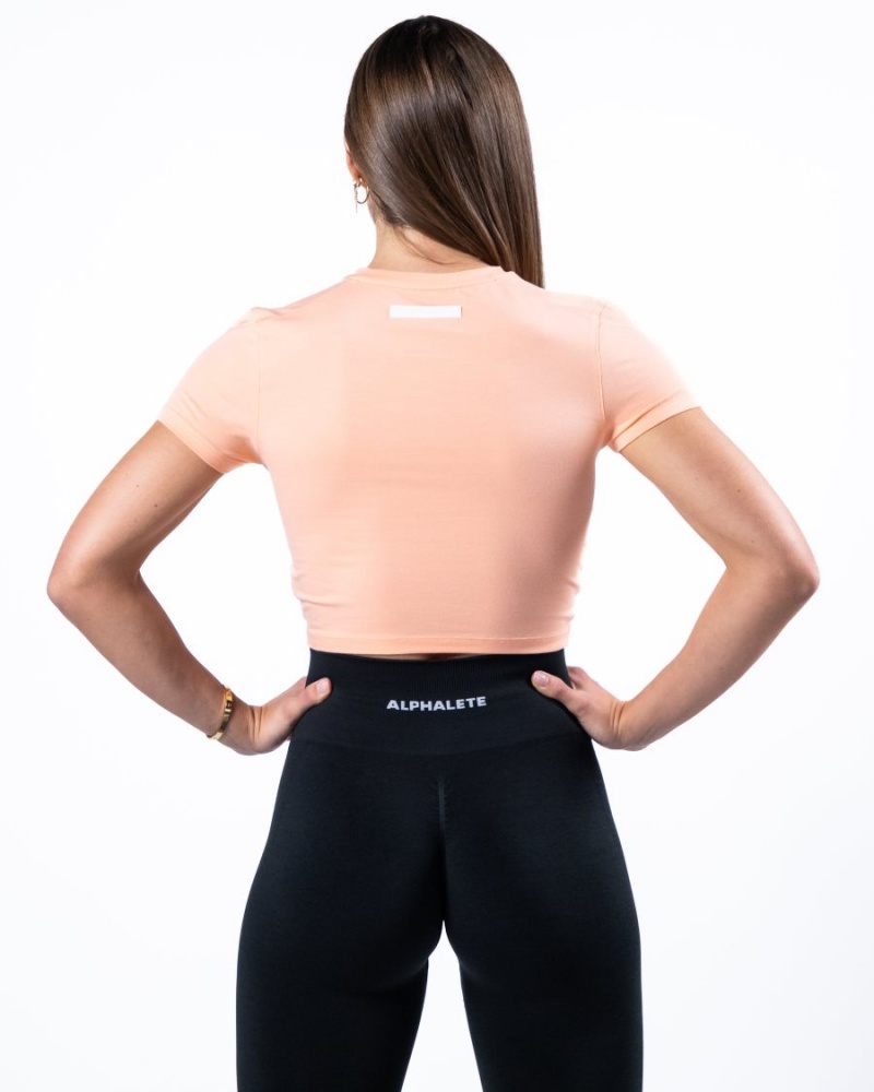 Cheeky Coral Alphalete Evo Twist Crop Women's Shirts | 0763285-BV