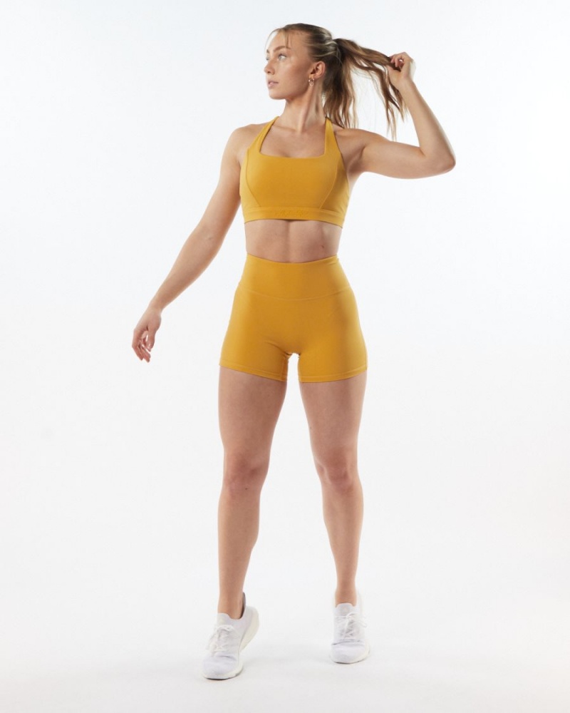 Exotic Yellow Alphalete Pulse Surge Short 4" Women's Shorts | 3897514-QP