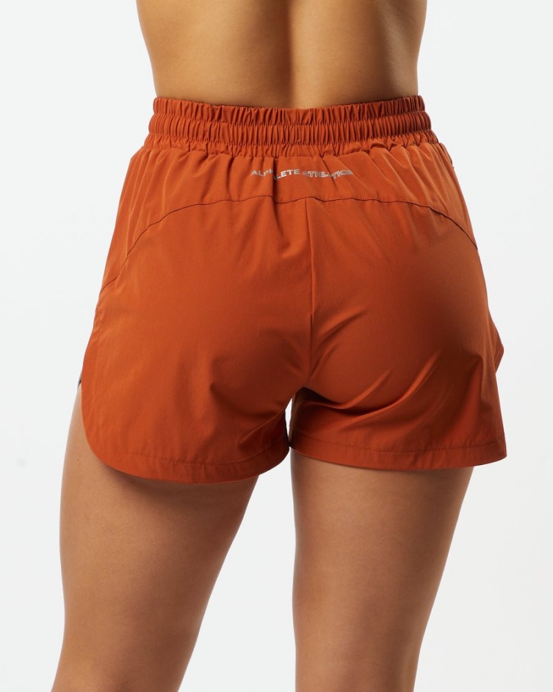 Sour Tangerine Alphalete Stride Short 3" Women's Shorts | 1972584-AD